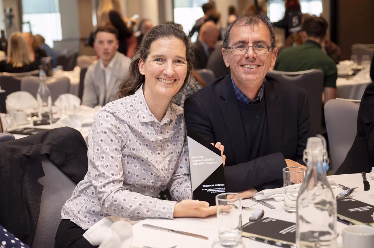 kate and christoph holding national apprenticeship award
